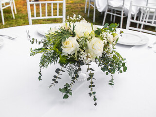 Luxury elegant wedding reception table arrangement and floral centerpiece - wedding banquet and event outdoor