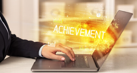 Closeup of businessman hands working on laptop