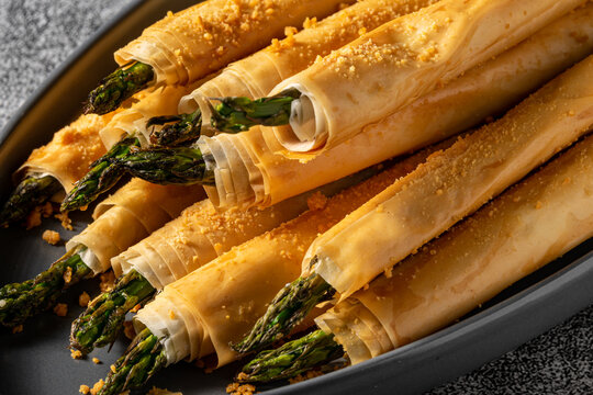 Cooked asparagus wrapped in phyllo dough.