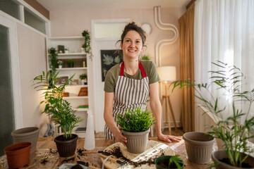 woman gardener florist portrait at home indoor happy female smile