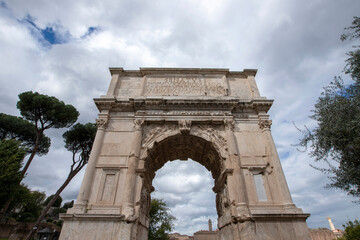 Fototapeta na wymiar Arch of Titus on the Via Sacra in the Roman Forum, Rome, Italy