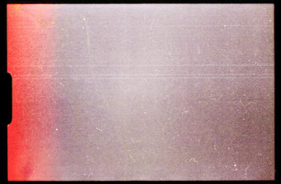 scan of empty super 8mm film frame with dust and scratches, cool film border mockup overlay.