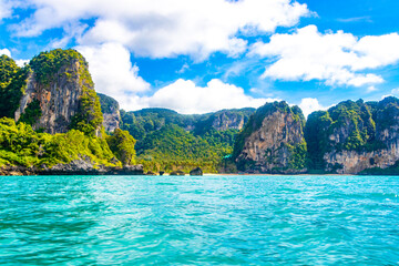 Naklejka na ściany i meble Tropical paradise turquoise water beach and limestone rocks Krabi Thailand.