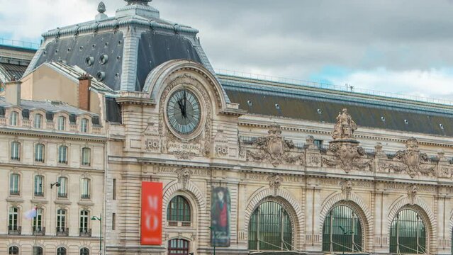 The musee d'Orsay timelapse. Museum in Paris, on the left bank of the Seine. View from Royal bridge. Musee d'Orsay has the largest collection of impressionist paintings in the world. Paris, France