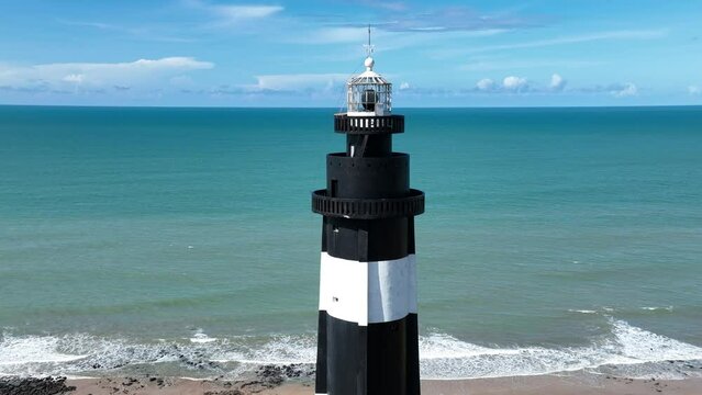 Calcanhar Lighthouse At Touros In Rio Grande Do Norte Brazil. Seascape Landscape. Coast Lighthouse. Nature Vegetation. Blue Sky Background. Calcanhar Lighthouse At Touros Rio Grande Do Norte Brazil.
