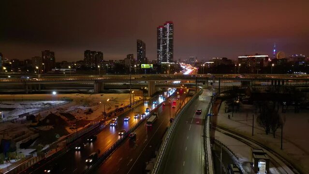 Moscow, Russia. Night view of the city from a bird's-eye view, Yaroslavskoe highway in the direction of the center of Moscow, A bird's-eye view. Automobile interchange