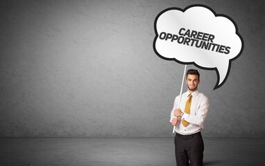 business person in casual holding road sign