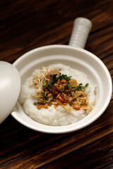 Chinese Claypot Chicken Porridge or Bubur Bakar or Panggang, Asian Style Breakfast.