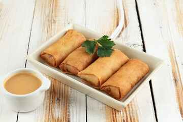 Lumpia or Loenpia Goreng, Deep Fried Spring Roll Served with Peanut Sauce