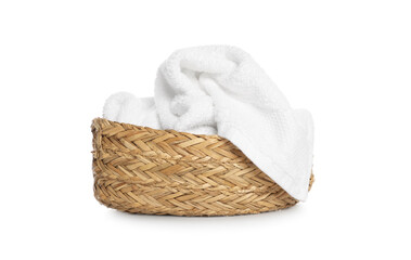 Obraz premium Wicker basket with crumpled bath towel isolated on white