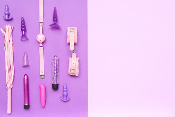 Different sex toys on purple background