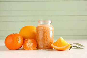 Jar of healthy smoothie and ingredients on table