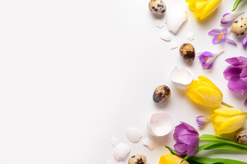 Composition with beautiful spring flowers, Easter eggs and shells on light background
