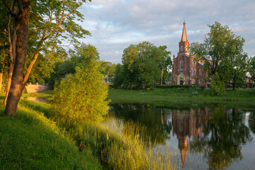 Lutheran Church of the Resurrection of Christ in Tsarskoye Selo on the bank of the 4th Lower Pond on a sunny summer day, Pushkin, St. Petersburg, Russia