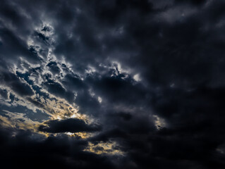 Background of dark clouds before a thunder-storm. Storm clouds in the dark sky. The dark background of bad weather.