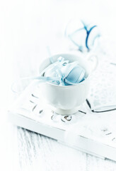 Easter Decoration. Bright wooden background. Close up.	