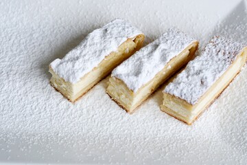 Sliced homemade cottage cheese apple pastila on wood cutting board. Traditional russian cuisine. High quality photo