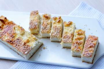 Traditional Ukrainian pies with eggs, green onion, sorrel on dark background. Russian piroshki, homemade baked patties. High quality photo