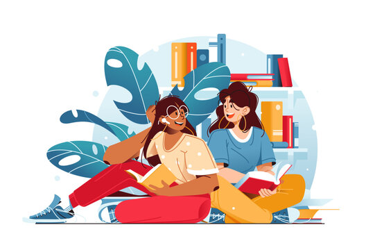 Girls sitting on floor reading books