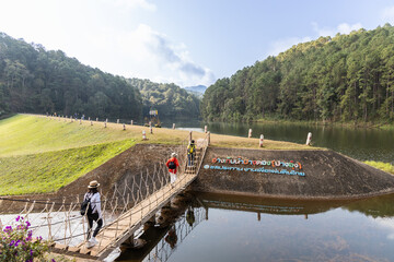 Pang Ung is a tourist attraction in Mae Hong Son, Northern Thailand with scenic alpine lake and pine trees. Thai words translate to Pang Ung Reservoir, Iffigation Work Thailand. - obrazy, fototapety, plakaty
