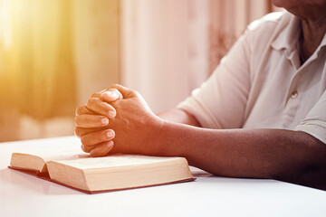 Hands woman with bible praying. Christian concept.