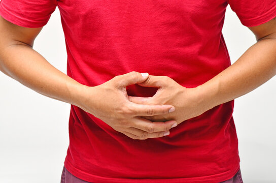 Man having abdominal pain ,stomach ech causes of  gastritis, stomach ulcer, food poisoning, diarrhea.