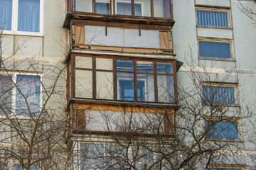Close-up of an old dilapidated balcony in an old soviet apartment building