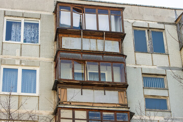 Close-up of old dilapidated balconies in an old soviet apartment building