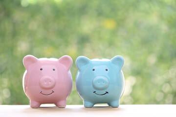 Finance, Piggy bank on natural green background, Saving money for prepare in future concept