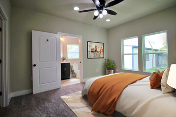 Luxurious king-size bed with modern furniture in a bright bedroom. Template for expensive bedroom. Concept for interior design, architecture, and lifestyle. 3D illustration. California, USA - 2023