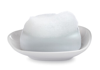Soap bar with fluffy foam in holder on white background