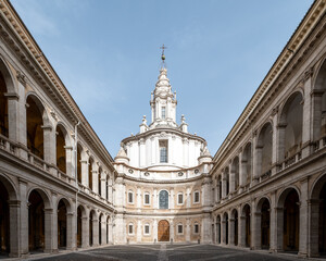 Fototapeta na wymiar Rome, Italy - September 16, 2021: The facade and atriuum of baroque church Chiesa di Sant'Ivo alla Sapienza designed by Francesco Borromini