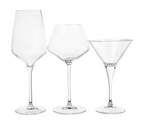 Elegant empty wine and martini glasses isolated on white