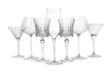 Elegant martini and wine empty glasses isolated on white