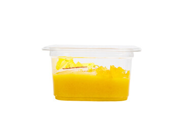 Smoothies with fresh fruits and nuts. Smoothie bowl, mango, passion fruit, coconut. Applesauce, lemon zest. Side view.