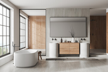 Modern bathroom interior with sink, tub and douche, accessories and window