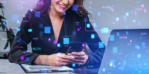 Woman with phone and laptop in office, blockchain interface