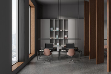 Modern business interior with pc computer on table, shelf with window