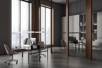 Gray and wooden CEO office corner
