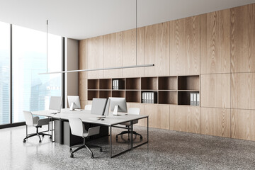 Light office interior with pc computer and shelf with panoramic window