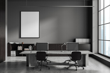 Grey business interior with pc computers and panoramic window. Mockup frame