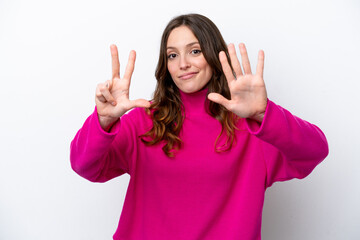 Young caucasian woman isolated on white background counting eight with fingers