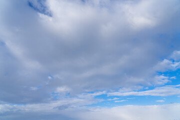 evening sky with clouds and rays of the sun, background