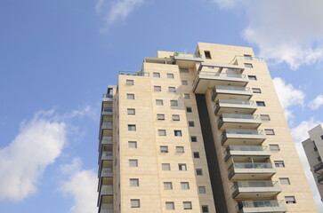 Modern residential multi-storey building. Concept: construction, real estate, housing for families