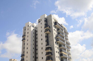 Modern residential multi-storey building. Concept: construction, real estate, housing for families