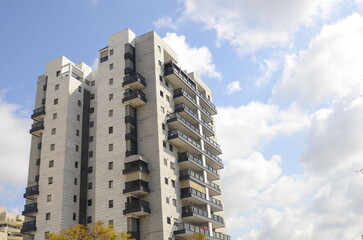 Modern residential multi-storey building. Concept: construction, real estate, housing for families