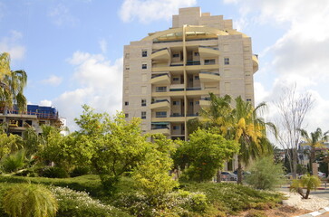 Modern residential multi-storey building. Concept: construction, real estate, housing for families