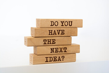 Wooden blocks with words 'Do You Have the Next Idea?'.