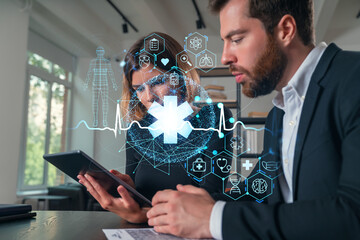 Businesspeople working together at office workplace. Concept of team work, business education, internet surfing, brainstorm, project information technology. Medical healthcare hologram