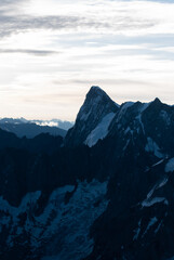 View on mountain range in snow in Alps